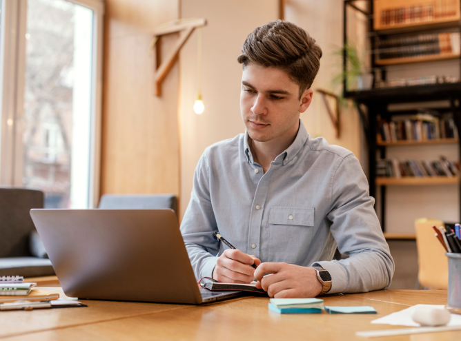 portrait-man-working-laptop 1